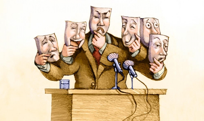 a politician speaks to the public with a set of masks